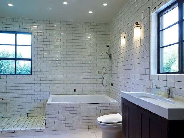 Massive bathroom with a bathtub